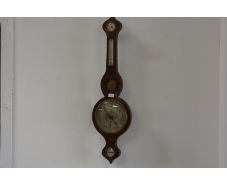 A late George III mahogany banjo style barometer with satinwood and ebony strung border, complete with dry and damp dial, the