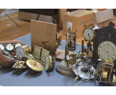A box containing a quantity of table and other clocks and clock parts including 100-day clocks, vintage wall mounted cuckoo c