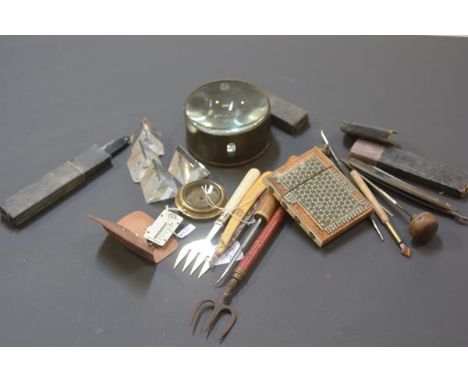 A bag containing a mixed group including a Sadelli-ware card case, large table top magnifying glass, toasting fork, prismatic