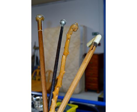 A GROUP OF 3 VARIOUS WALKING STICKS INCLUDING A MARQUETRY WORK EXAMPLE, TOGETHER WITH A MILITARY SWAGGER STICK     