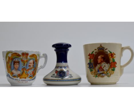 A ROYAL DOULTON 1937 CORONATION CUP & A 1902 CORONATION CUP, TOGETHER WITH A PUSSER'S RUM BRITISH NAVY CERAMIC DECANTER     