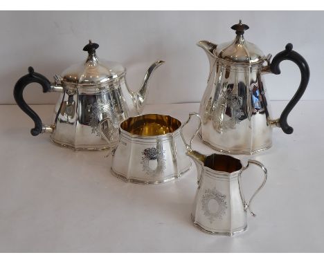 A fine heavy-gauge four-piece tea service comprising teapot, hot-water jug, two-handled sugar and creamer, the sugar and crea