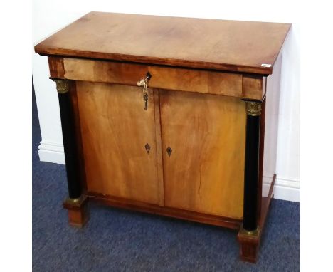 A 19th century&nbsp;Biedermeier-style mahogany side cabinet, single full-width drawer above two panelled doors enclosing shel