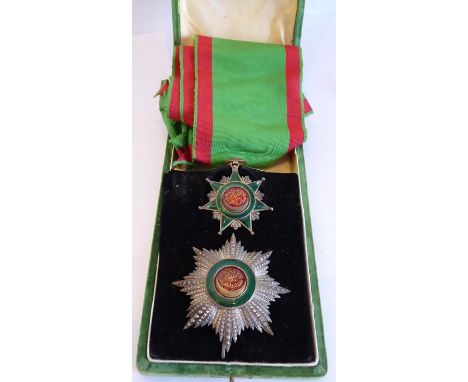 The Ottoman Empire, the Order of Osmanieh - First Class; the (6cm wide) badge, 9cm breast star and sash in their original cas
