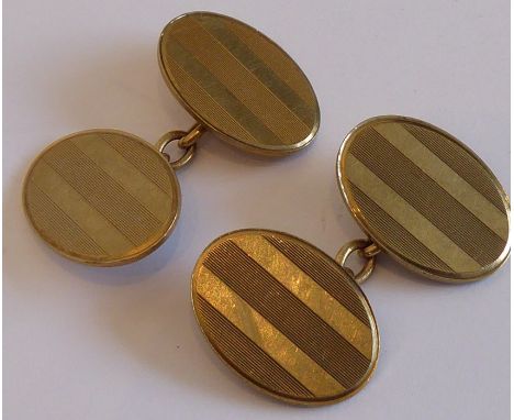 A pair of gentleman's 9-carat yellow-gold oval cufflinks with engine-turned style decoration (boxed)&nbsp;(approx. 11.09g)