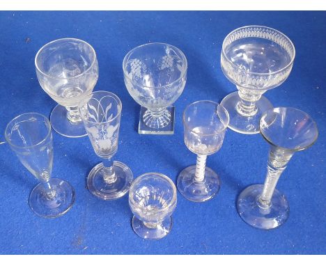 A good varied selection of drinking glasses (some engraved) including rummers and wines, one rummer engraved with a hare cour