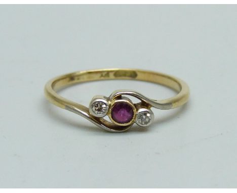 An 18ct gold, ruby and diamond three stone ring, 1.5g, K/L 