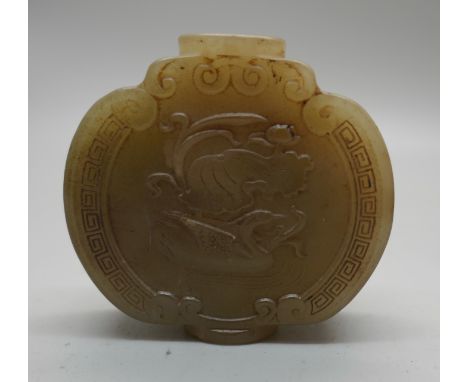 A carved jade scent bottle, lacking stopper 