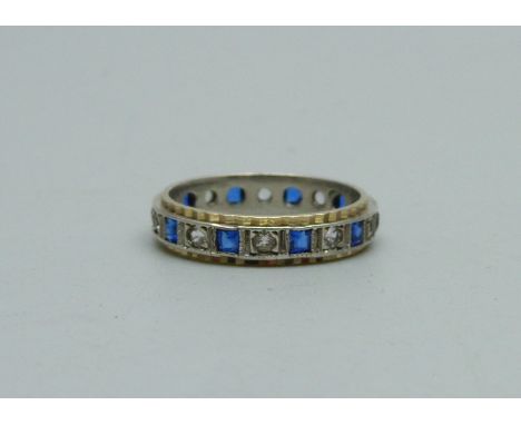 A 9ct gold and silver eternity ring, L 