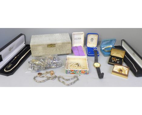 A box of vintage costume jewellery 