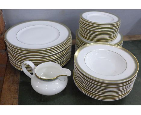 A Royal Doulton Clarendon part dinner service, 16 dinner and side plates, 15 tea plates, 14 soup/cereal bowls and a jug **PLE
