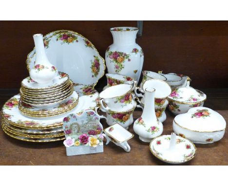 Royal Albert Old Country Roses; six dinner plates, two bread and butter plates, a vase and two posy vases, 2 x four cups and 