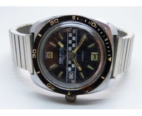 A Timex Grand Prix wristwatch in original box 