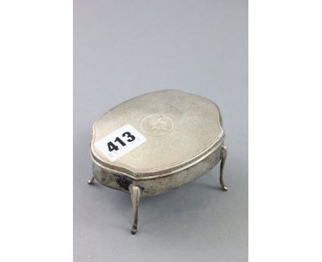 Silver Trinket Box raised on four slender legs, engine turned decoration to the hinged lid, Birmingham 1915 