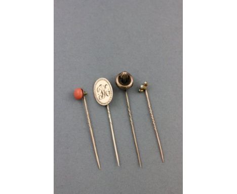 Two Victorian 9ct Gold Stick Pins and Two Yellow Metal Stick Pins