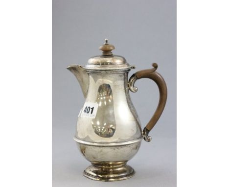Silver Hot Water Pot, plain body with beaded edges, wooden handle and finial, Birmingham 1931, Henry Clifford Davis