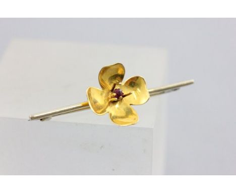 Early 20th century 9ct Gold Bar Brooch with Flower set with a small ruby