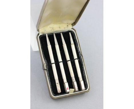 Cased Set of Four Sterling Silver Bridge Propelling Pencils, each with engine turned bodies