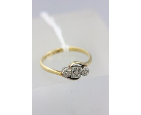 18ct Gold Ring, with three small diamonds in a platinum illusion setting