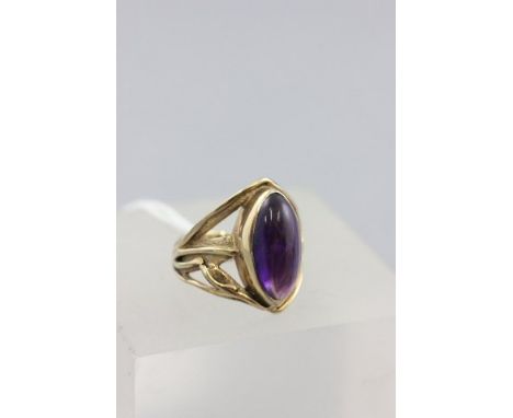 9ct Gold Dress Ring set with a Single Oval Cabochon Amethyst