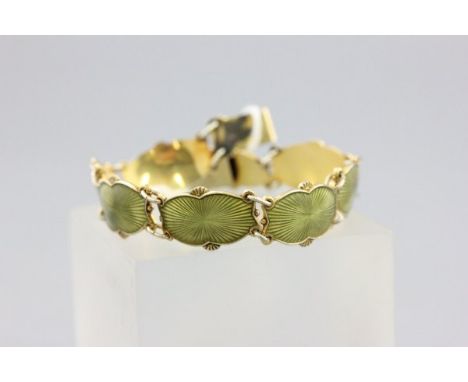 Norwegian Sterling Silver Gilt Bracelet, with eight green guilloche enamel panels