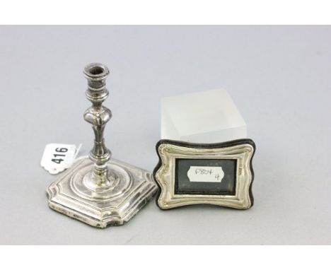 Silver Beaker, engraved and dated 1945, Single Silver Candlestick, Birmingham 1906 and a Small Silver Photograph Frame