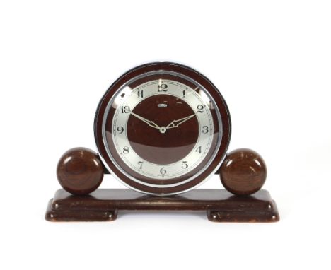 An Art Deco oak and chrome Metamec mantel clock 