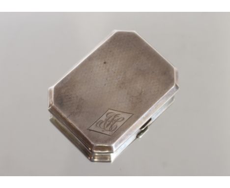 A silver Art Deco cigarette case, with engine turned decoration and monogram