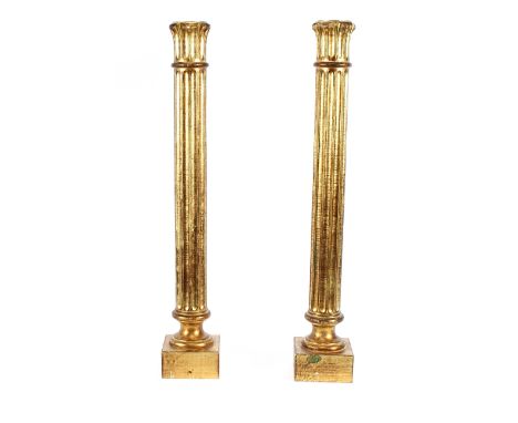 A pair of large gilt wood lamp bases, 90cm