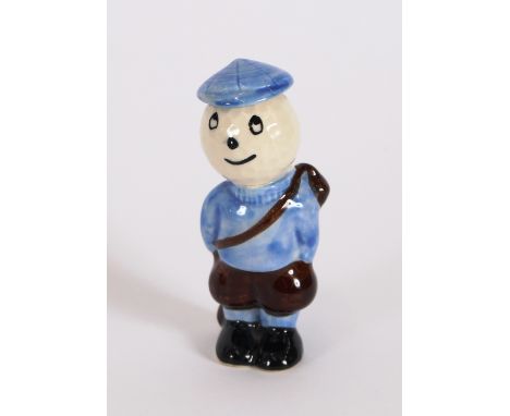 A Crown Devon pottery model of a golfing caddy, 9cms high