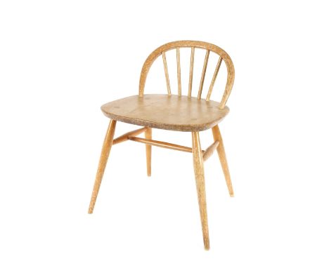 A pair of Ercol stick back child's chairs