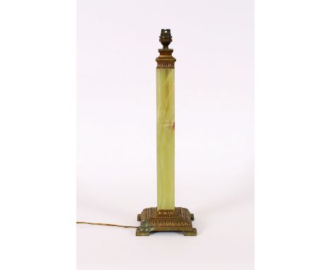 A large green onyx and brass mounted lamp base