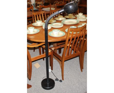 A Swedish black adjustable floor lamp