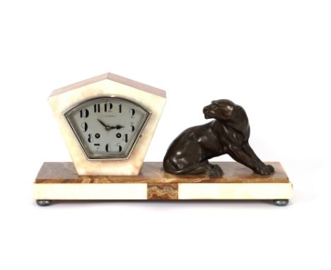 An Art Deco marble mantel clock by Jacques, decorated with a spelter figure of a recumbent panther, 46cm long