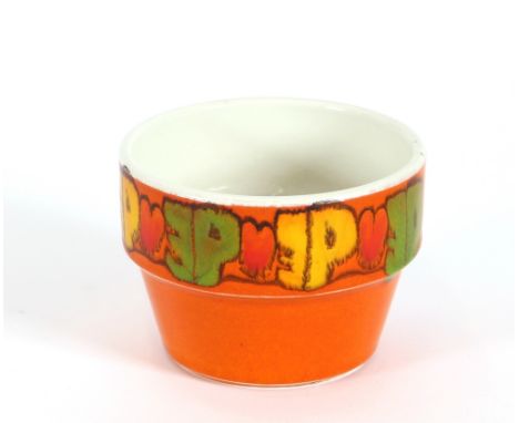 A Poole pottery Delphis ware vase, having stylised decoration on an orange ground, 8cms high