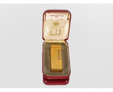 A Dunhill "Rollagas" lighter, in original fitted case