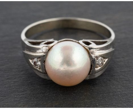 A cultured pearl and single-cut diamond ring, diameter of cultured pearl ca. 8.6mms, the cultured pearl of white hue with pin