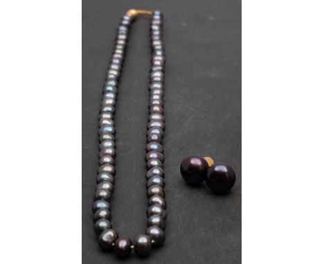 A single-row, cultured 'Tahitian' pearl necklace and pair of cultured, 'Tahitian', button, pearl ear studs, diameter of cultu