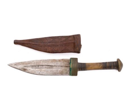 A small Indo-Persian knife,  the short broad blade with single fuller over a brass hilt with horn brass banded grip, in a wor