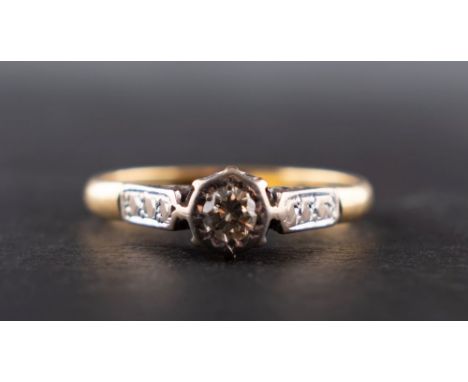 A round, brilliant-cut diamond single-stone ring, estimated diamond weight ca. 0.15ct, tinted colour, VS1-2 clarity, stamped 