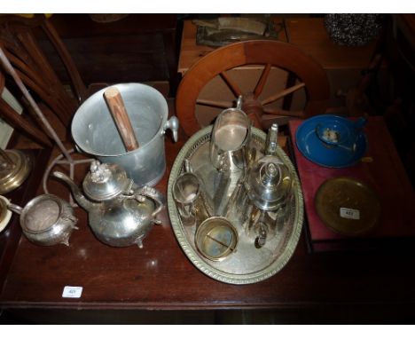 A quantity of silver platedware; an enamel chamber stick etc. 