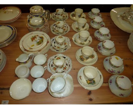 A quantity of various china teacups and saucers, side plates etc. 