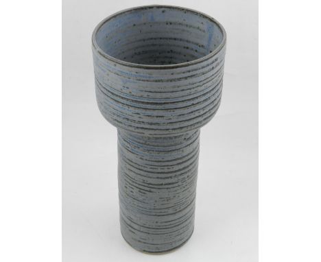 A Swedish(?) grey glazed ceramic stem vase, having ribbed decoration, bears indistinct monogram to side. H.26cm.