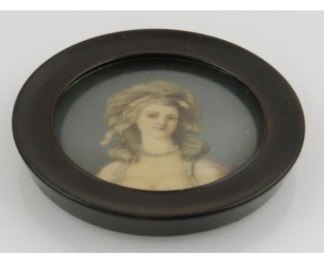 Late 18th / early 19th century English school, a circular portrait miniature of a young lady. 