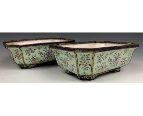 A pair of Chinese Canton enamel jardinieres, decorated flowers on a pale green ground, 19.5 cm wide (2) both generally good w