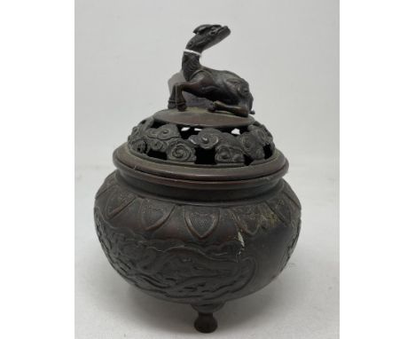 A Japanese bronze koro and cover, with a dragon finial, 17 cm high 