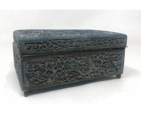 A Chinese blue box and cover, decorated a dragon and an exotic bird, on an enamel frame, 17 cm widedirty, hinge weak so lid d
