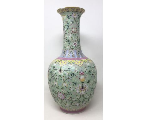 A Chinese vase, decorated flowers in enamel colours, character mark to base, 36 cm highGilt is rubbed to the neck and also on