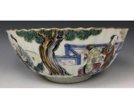 A Chinese bowl, of lobed circular form, decorated figures in famille rose enamel colours, painted seal mark to base, 19 cm di