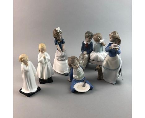 ROYAL DOULTON FIGURE OF BEDTIME, HN 1978, along with another Royal Doulton figure of 'Darling', HN 1985 and four Nao figures 